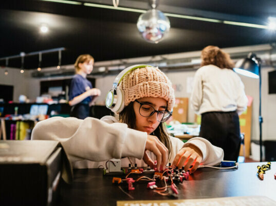 a girl making a prototype